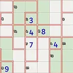 Cuadrícula con celdas numeradas en azul y verde, divididas por líneas rojas