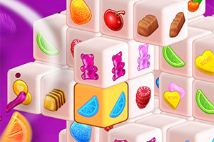 Cubos blancos adornados con imágenes de caramelos y frutas brillantes en un fondo púrpura