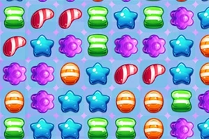 Caramelos de diferentes formas y colores dispuestos en filas sobre un fondo azul con detalles brillantes