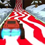 Coche rojo en una pista ondulada roja y blanca rodeada de nieve y árboles