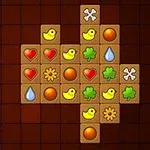 Cuadrícula con fichas de símbolos como patos, corazones, gotas de agua y tréboles en un tablero oscuro