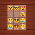 Emojis con diversas expresiones faciales organizados en una cuadrícula sobre un fondo de madera
