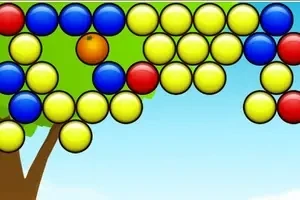 Bolitas de colores amarillo, azul y rojo organizadas en filas sobre un fondo de árbol y cielo azul