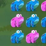 Ranas de colores azul y rosa organizadas en una cuadrícula sobre un fondo verde, con una rana azul sosteniendo una moneda dorada