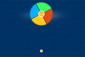Círculo grande dividido en cuatro colores (azul, verde, rojo y amarillo) sobre un fondo azul con un pequeño punto amarillo debajo