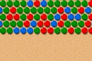 Filas de esferas rojas, verdes y azules dispuestas sobre un fondo beige