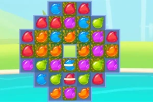 Caramelos de colores brillantes en un tablero de forma cruz sobre un fondo azul y verde