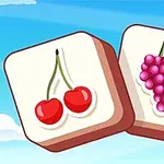 Dos fichas cuadradas con dibujos de cerezas y uvas sobre un fondo de cielo azul con nubes