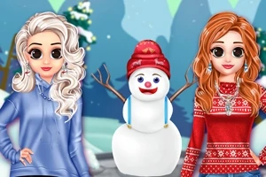 Dos mujeres con atuendos invernales junto a un muñeco de nieve, con un paisaje nevado de fondo