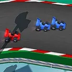 Cuatro pequeños vehículos de carreras, tres azules y uno rojo, compiten en una pista con bordes de color rojo y blanco