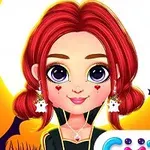 Niña con cabello rojo y maquillaje de Halloween, rodeada de murciélagos y arañas, con un fondo de luna llena