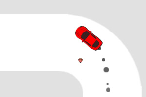 Auto rojo derrapando en una curva sobre una pista blanca con marcas de neumáticos