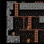 Pantalla de un videojuego clásico retro con plataformas, escaleras y ladrillos en un entorno de cueva subterránea