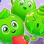 Tres personajes verdes con ojos grandes y expresiones animadas, uno sosteniendo una estrella roja y otro con brillo alrededor