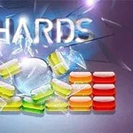 Texto SHARDS en la parte superior, con bloques de colores brillantes y fragmentos de cristal que parecen romperse en el centro