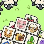 Piezas ilustradas con animales y objetos coloridos, rodeadas de ovejas sobre un fondo verde