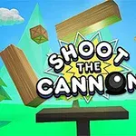 Título en negritas Shoot the Cannon con bloques de madera y caja en un entorno de bosque con un cañón en primer plano