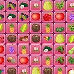 Rejilla de bloques rosas con dibujos de frutas y verduras variadas, incluyendo uvas, piñas, aguacates y manzanas