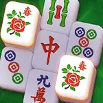 Fichas de dominó chino con diseños de flores, círculos y caracteres rojos sobre un fondo verde