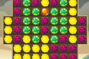 Rejillas con frutas coloridas en grupos de colores verde, morado y amarillo en un patrón de juego de combinación