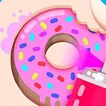 Dona rosa con chispas de colores siendo rociada con una lata de aerosol
