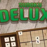 Juego de sudoku con tablero de números y título en letras grandes y verdes sobre un fondo de madera