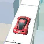 Auto rojo transita por un camino estrecho rodeado de edificios geométricos en tonos pastel