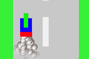 Figura geométrica de colores sobre una carretera gris con líneas blancas, rodeada de un fondo verde, con esferas blancas detrás
