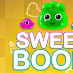 Tres personajes de gelatina de colores rosa, verde y azul sobre un fondo amarillo con un texto grande que dice SWEET BOOM