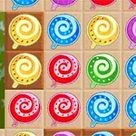 Caramelos de colores brillantes en forma de espiral dispuestos en una cuadrícula