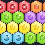 Hexágonos coloridos con símbolos de flores, estrellas y lunas en un patrón repetitivo