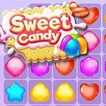 Tablero colorido de caramelos con chef caricaturizado de pie al frente, y un letrero que dice Sweet Candy en la esquina superior izquierda
