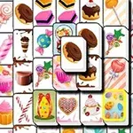 Fichas de mahjong con imágenes de postres coloridos como pasteles, helados y caramelos