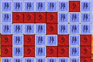 Cuadrícula de bloques azules con bombas y bloques rojos con el número nueve