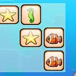 Cuadro de juego con imágenes de estrellas de mar, caballitos de mar y peces tropicales sobre un fondo azul
