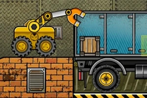 Truck Loader 4 Una grúa amarilla mueve una caja de madera hacia la parte trasera de un camión azul y negro en un entorno industrial