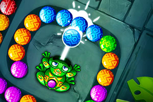 Rana verde disparando esferas de colores hacia una fila de bolas en un escenario tipo laberinto